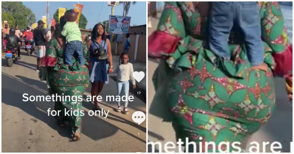 Boy standing on mom's behind Boy standing on mom's behind