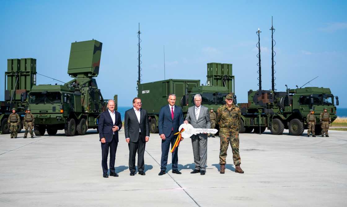 Former German chancellor Olaf Scholz, on the left, in front of an IRIS-T SLM medium range air defence system in Todendorf, northern Germany, on September 4, 2024 Former German chancellor Olaf Scholz, on the left, in front of an IRIS-T SLM medium range air defence system in Todendorf, northern Germany, on September 4, 2024