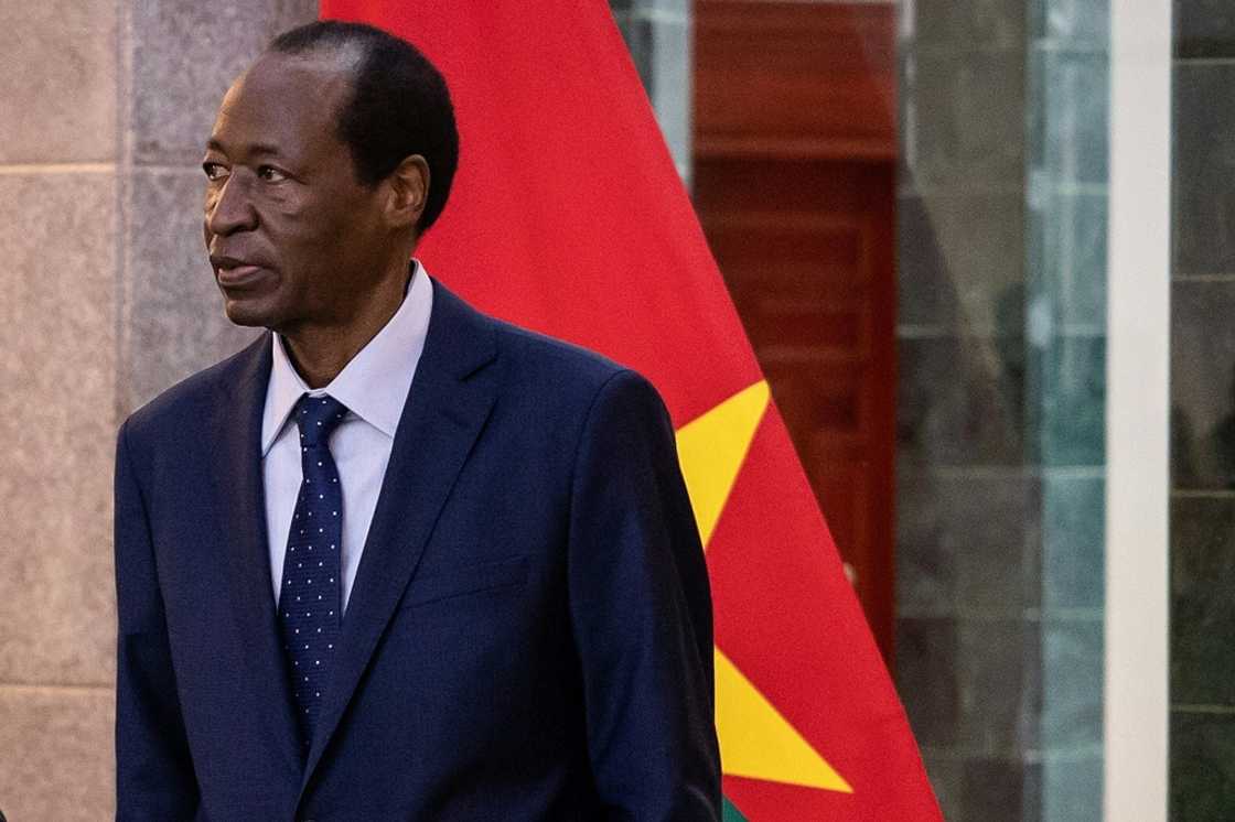 Compaore, pictured at the presidential palace in Ouagadougou on July 8, during his brief return to the country Compaore, pictured at the presidential palace in Ouagadougou on July 8, during his brief return to the country
