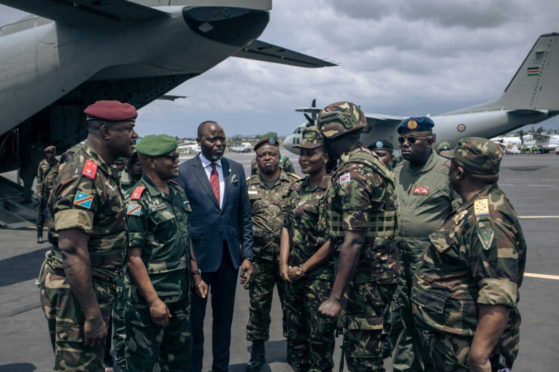 The Kenyan troops were greeted by local dignitaries