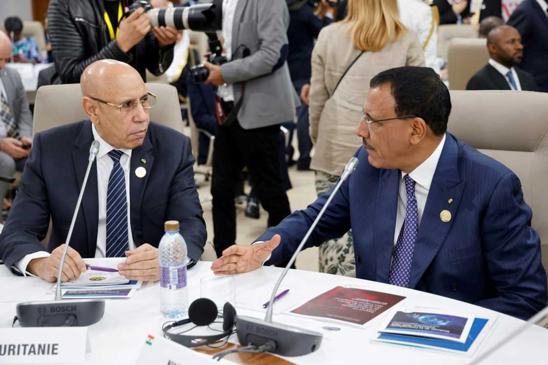 Mauritanian President Mohamed Ould Ghazouani (L) attends with Niger's President Mohamed Bazoum a working session during the International Organisation of Francophonie summit in Tunisia Mauritanian President Mohamed Ould Ghazouani (L) attends with Niger's President Mohamed Bazoum a working session during the International Organisation of Francophonie summit in Tunisia