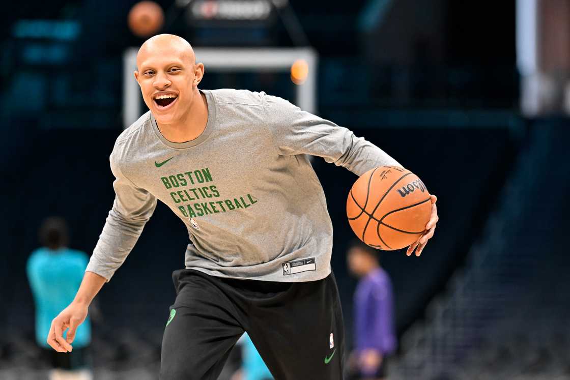 Jordan Walsh warms up prior to his preseason game Jordan Walsh warms up prior to his preseason game