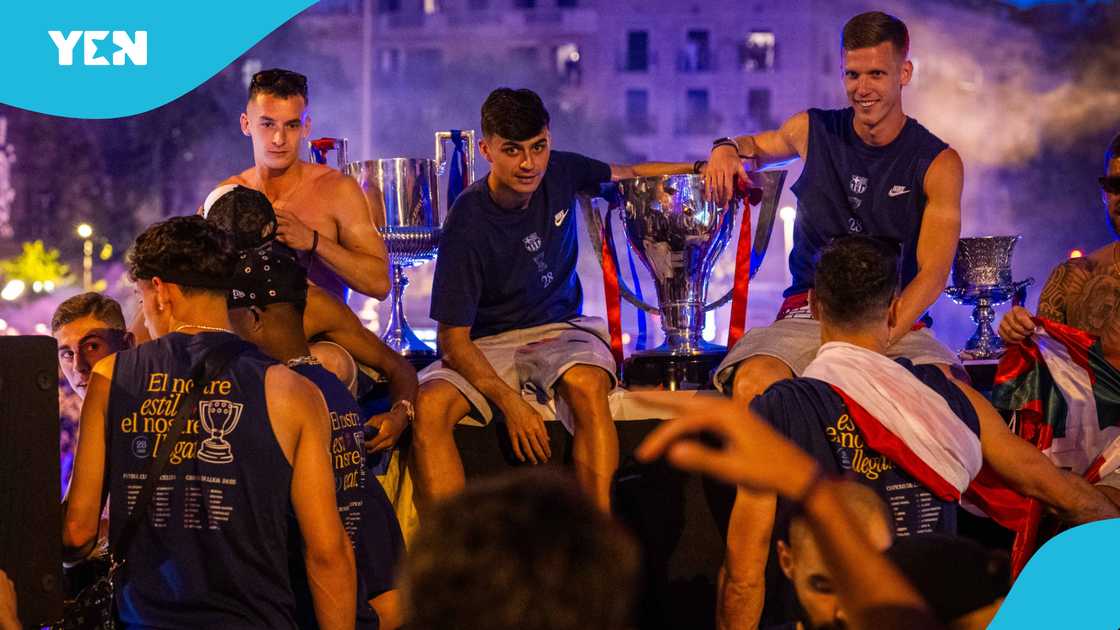 Barcelona defenders Inigo Martinez and Ronald Araujo entertained fans and teammates alike with dramatic falls during the team’s La Liga victory parade on May 16, 2025