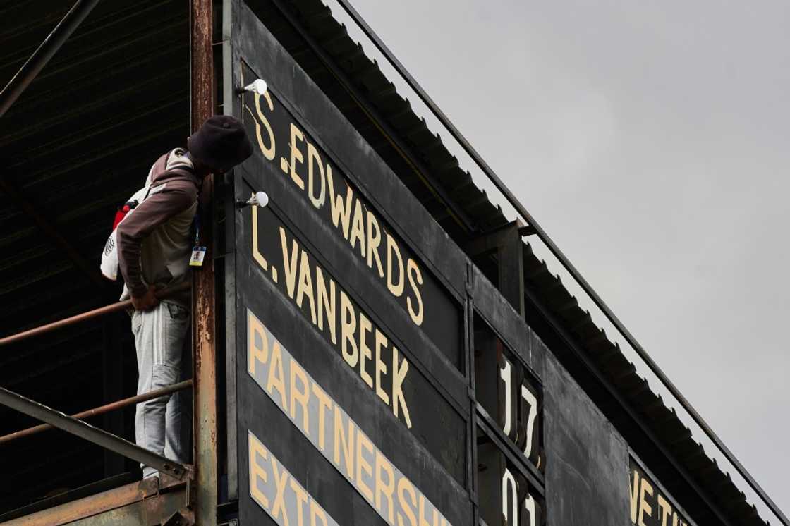 The manually operated scoreboard in Bulawayo is one of the last of its kind in international cricket