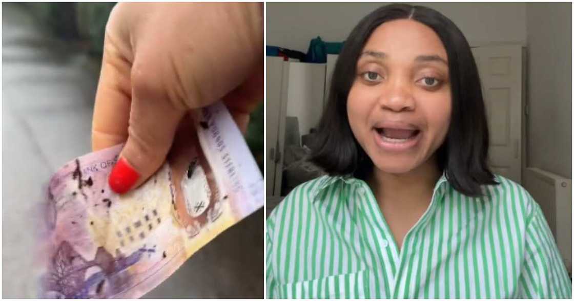 Lady shows money she picked on road in the UK, shocks people Lady shows money she picked on road in the UK, shocks people