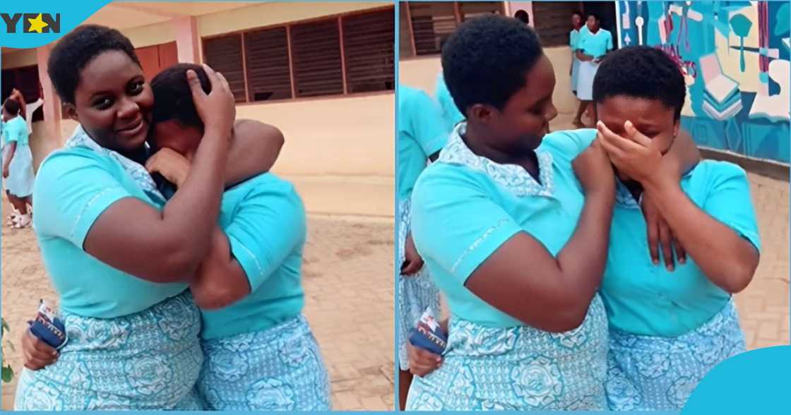 Photo of Kumasi Girls student trying to comfort her junior on campus. Photo of Kumasi Girls student trying to comfort her junior on campus.