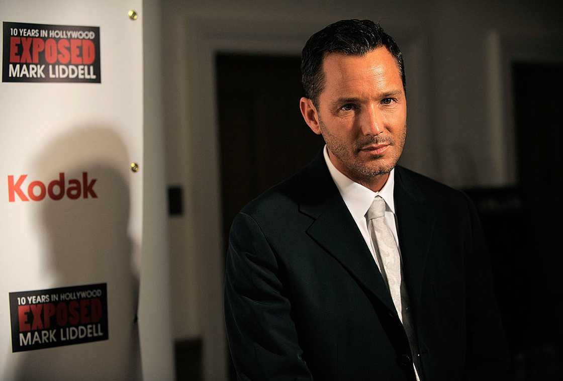 Mark Liddell in a black suit and white shirt Mark Liddell in a black suit and white shirt