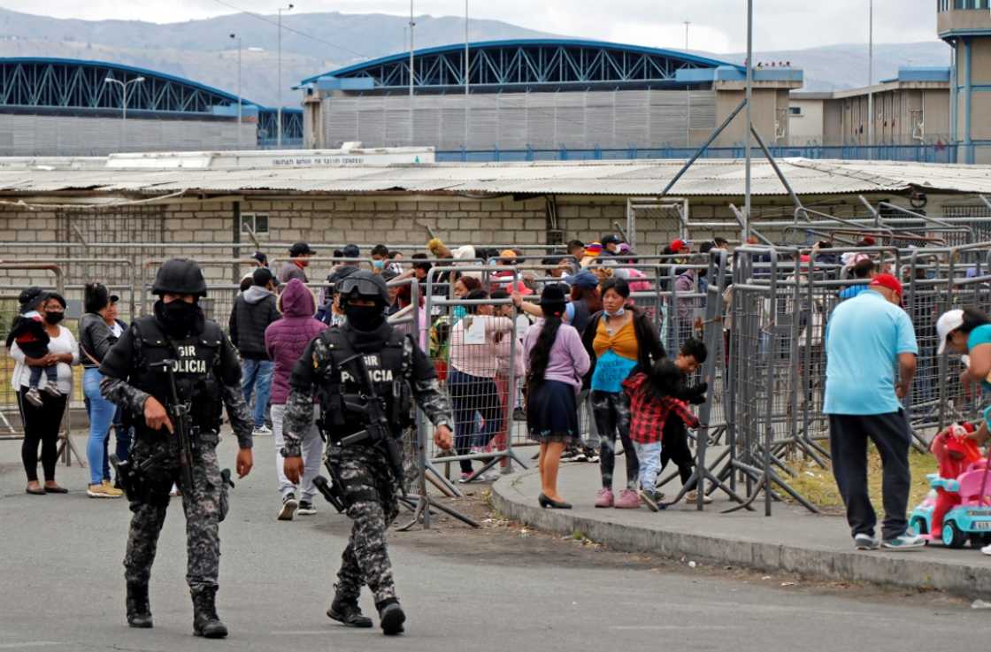 Members of Ecuador's Police Intervention and Rescue Group (GIR) outside the Regional Sierra Centro Norte Cotopaxi prison Members of Ecuador's Police Intervention and Rescue Group (GIR) outside the Regional Sierra Centro Norte Cotopaxi prison