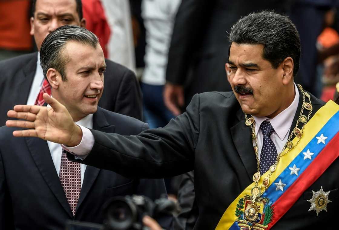 El Aissami (L) was a close ally of President Nicolas Maduro (R), whom he served as vice president