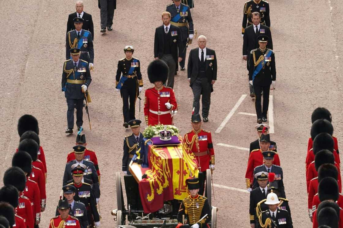 King Charles III led the royal family in procession behind a horse-drawn gun carriage bearing the casket King Charles III led the royal family in procession behind a horse-drawn gun carriage bearing the casket