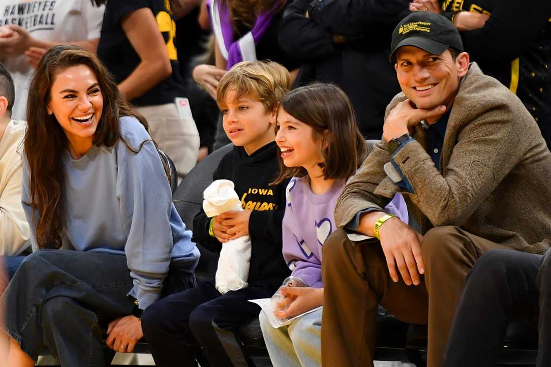 Actors Mila Kunis and Ashton Kutcher and their children