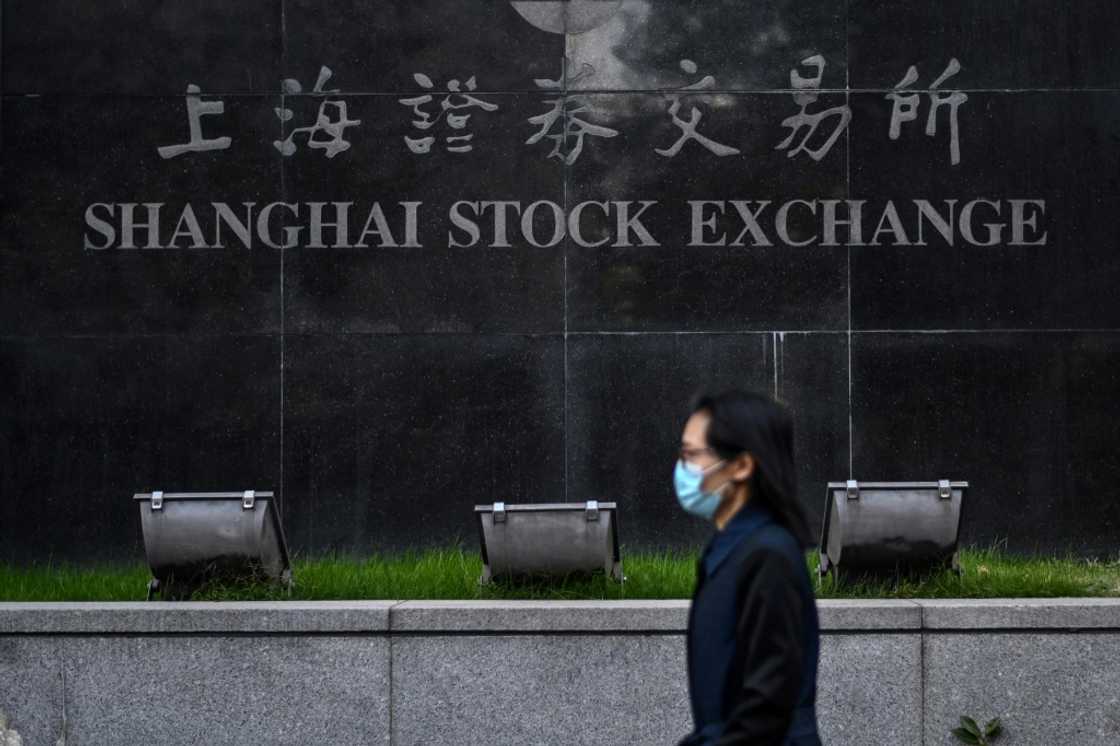 The Shanghai Stock Exchange was among those dropping Friday morning following another selloff on Wall Street The Shanghai Stock Exchange was among those dropping Friday morning following another selloff on Wall Street