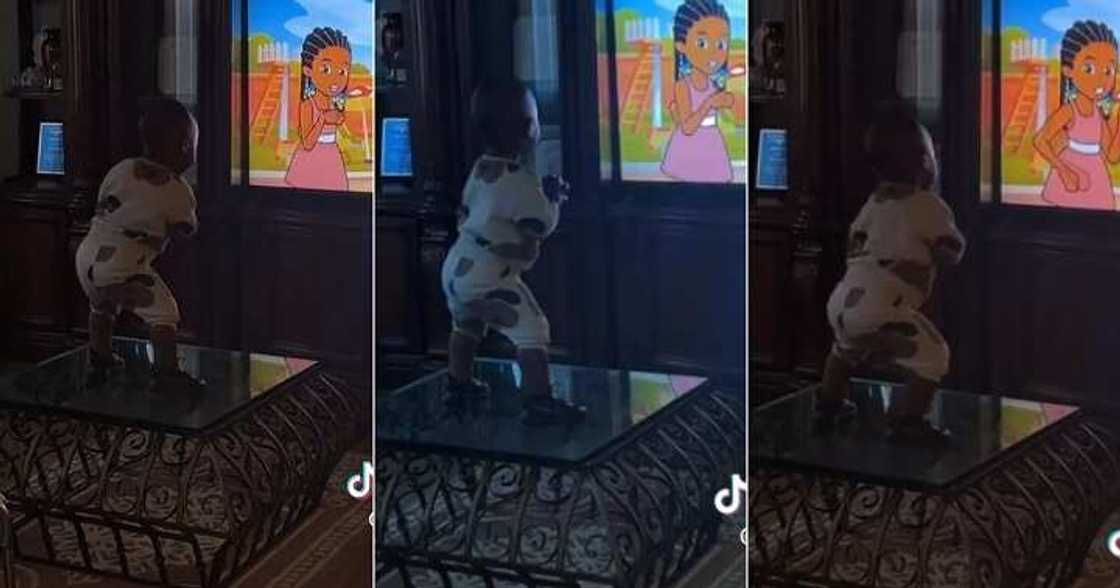 Little boy dances, moves his hips at home