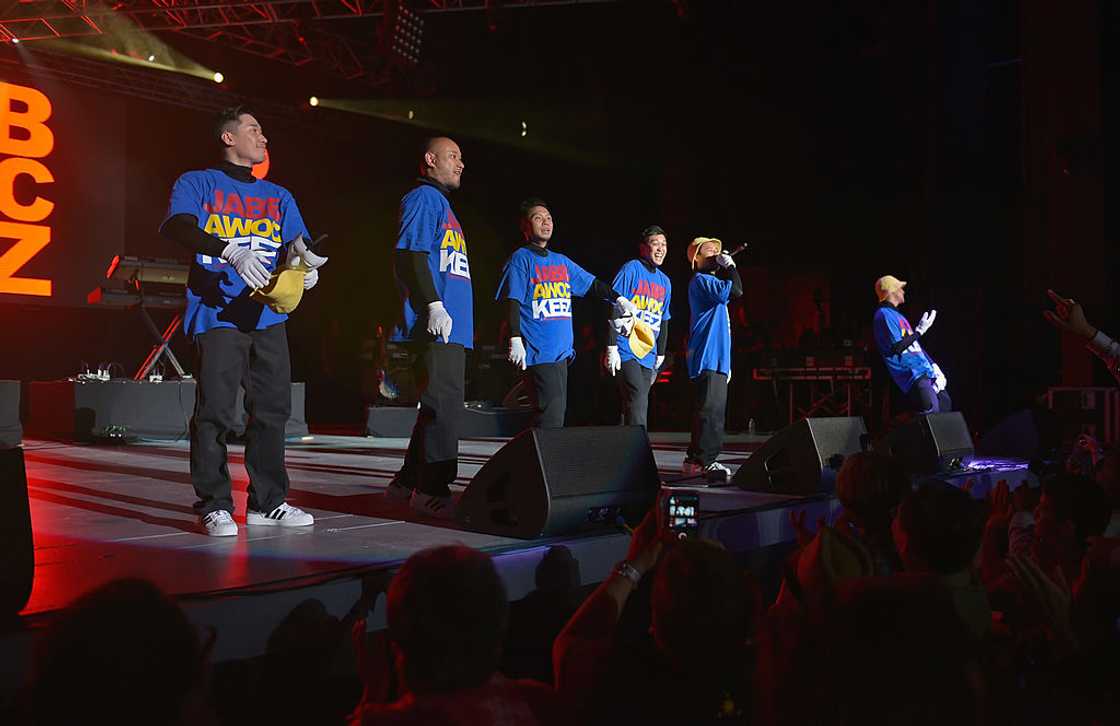 Hip-hop dance troupe Jabbawockeez perform at the Rebuild! Benefit For Typhoon Haiyan Survivors