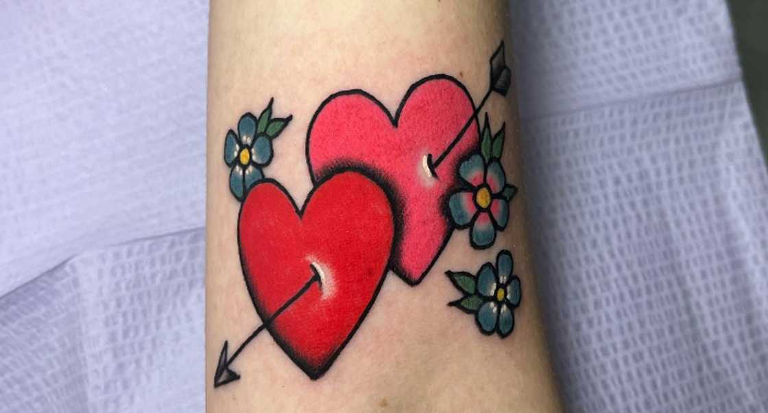 Hearts and arrow tattoo