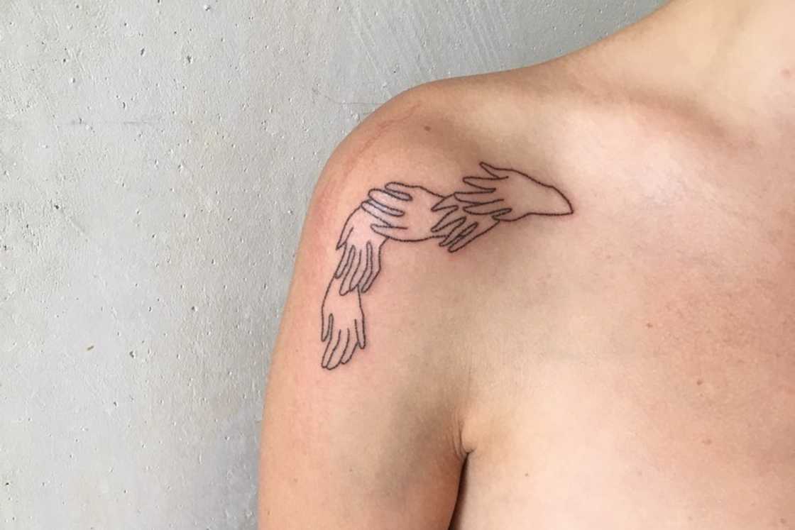 Multiple hands shoulder front tattoo Multiple hands shoulder front tattoo