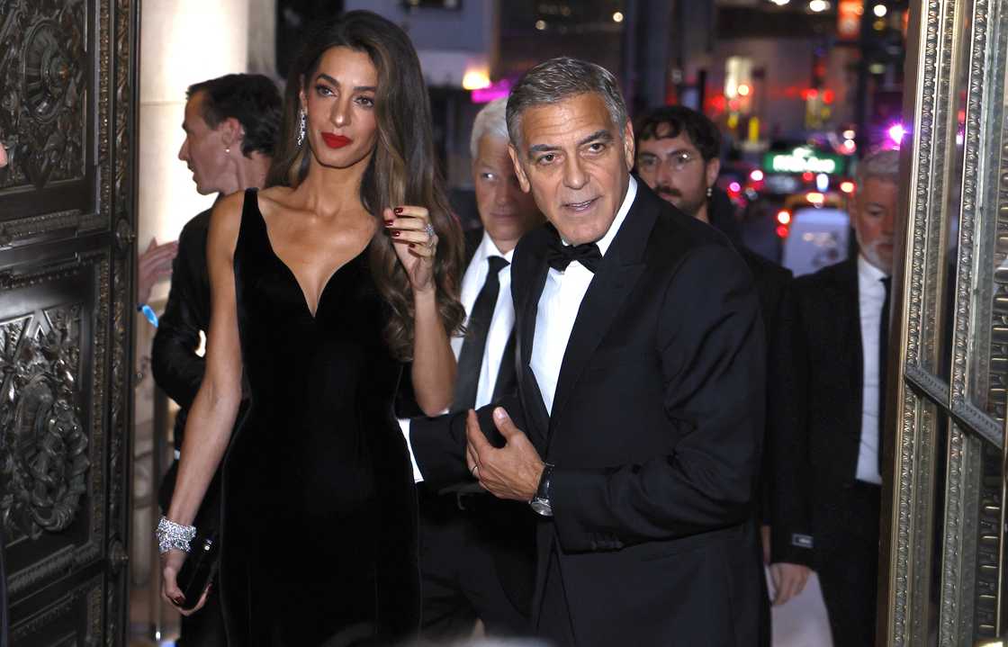 George Clooney and his wife Amal Clooney arrive for "The Albies"