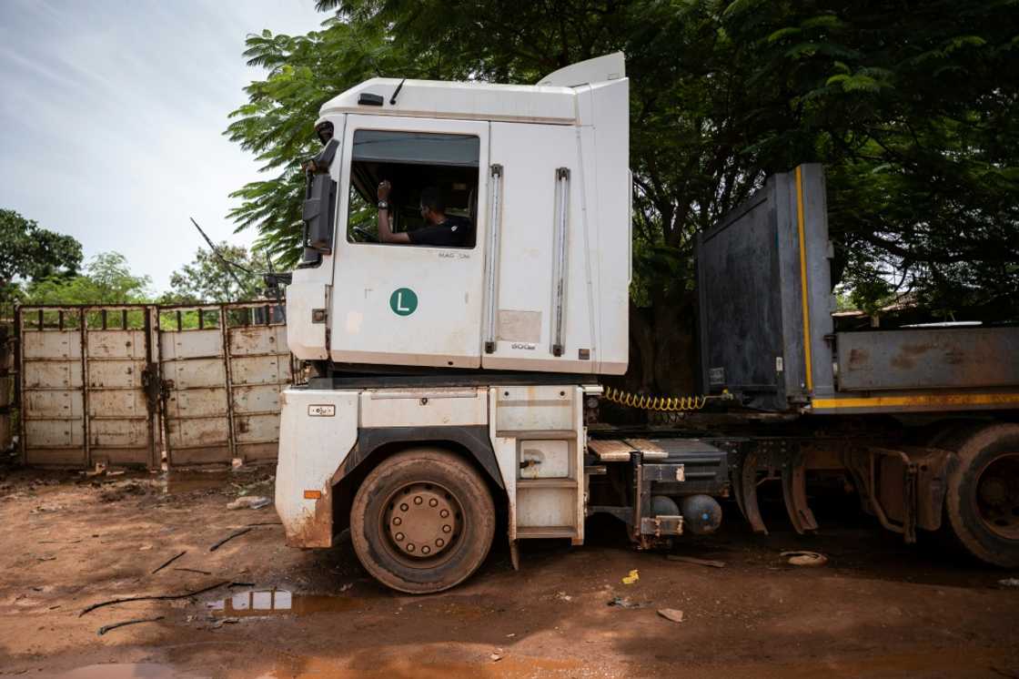 Aziz turned his lorry around to find shelter in the first village he could reach Aziz turned his lorry around to find shelter in the first village he could reach