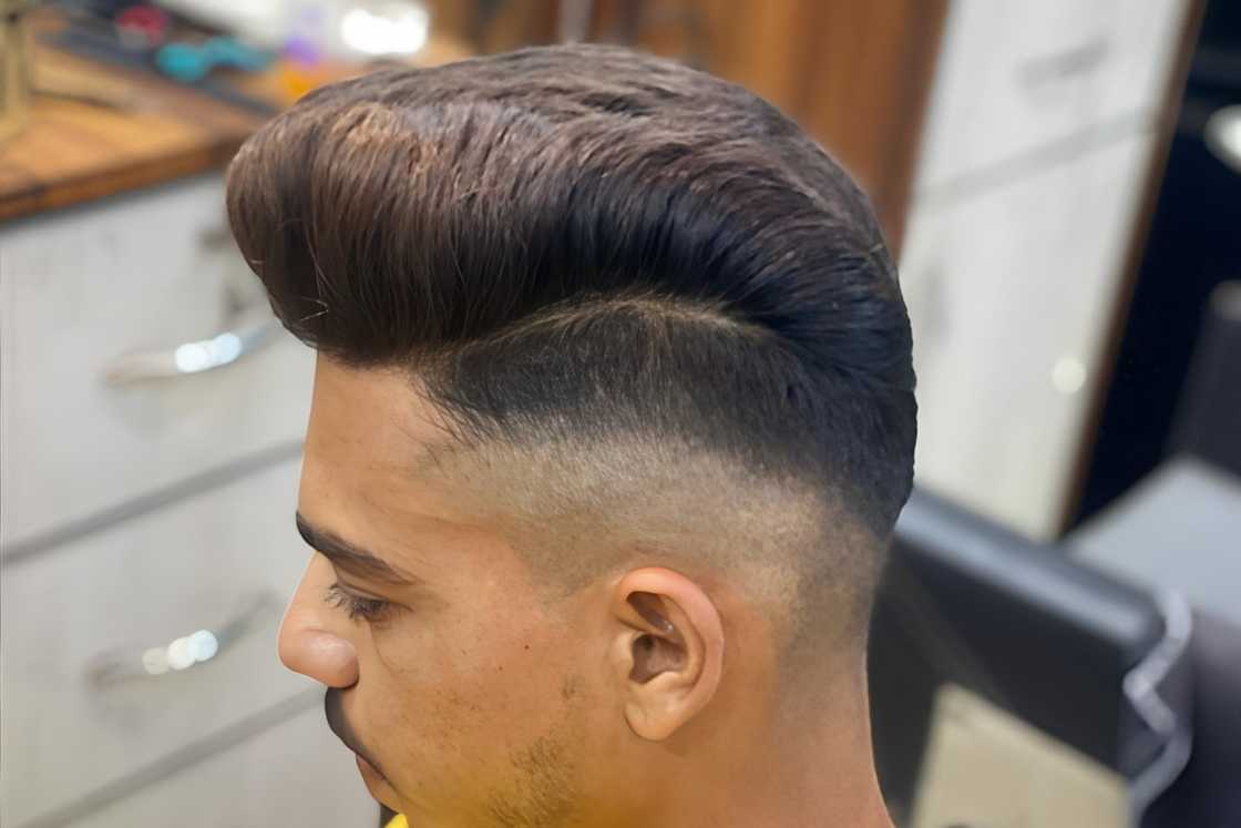 A man with a quiff haircut