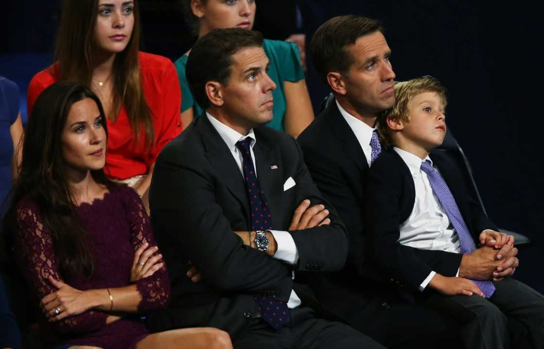 Ashley Biden (L), Hunter Biden (C) and the late Beau Biden (R)  watch their father, now-President Joe Biden, speak at the Democratic National Convention in North Carolina in 2012