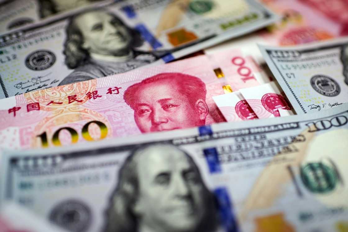 The yuan has been hit as the Federal Reserve ramps up interest rates, sending investors piling into the dollar The yuan has been hit as the Federal Reserve ramps up interest rates, sending investors piling into the dollar