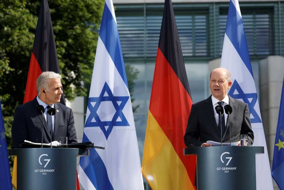 German Chancellor Olaf Scholz and Israeli Prime Minister Yair Lapid (L) hold a joint press conference after talks in Berlin, Germany, on September 12, 2022 German Chancellor Olaf Scholz and Israeli Prime Minister Yair Lapid (L) hold a joint press conference after talks in Berlin, Germany, on September 12, 2022