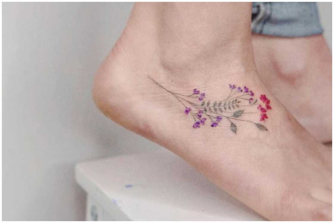 Tiny floral tattoo