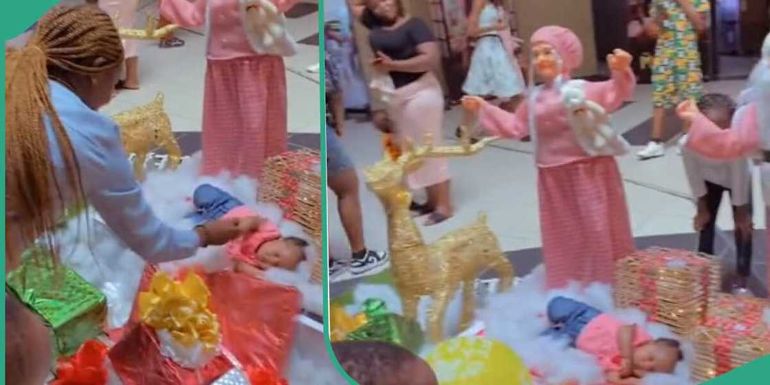 Baby catches people's attention in mall for sleeping in gift section Baby catches people's attention in mall for sleeping in gift section