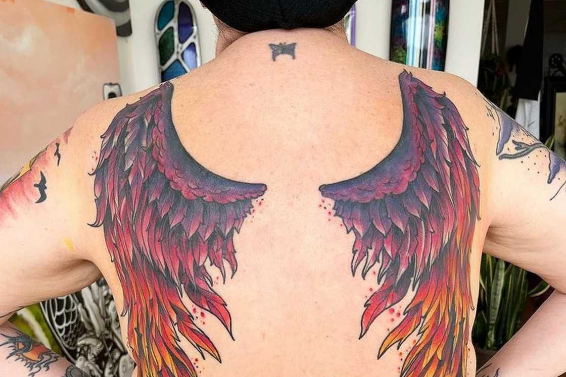 feminine rebirth phoenix tattoo