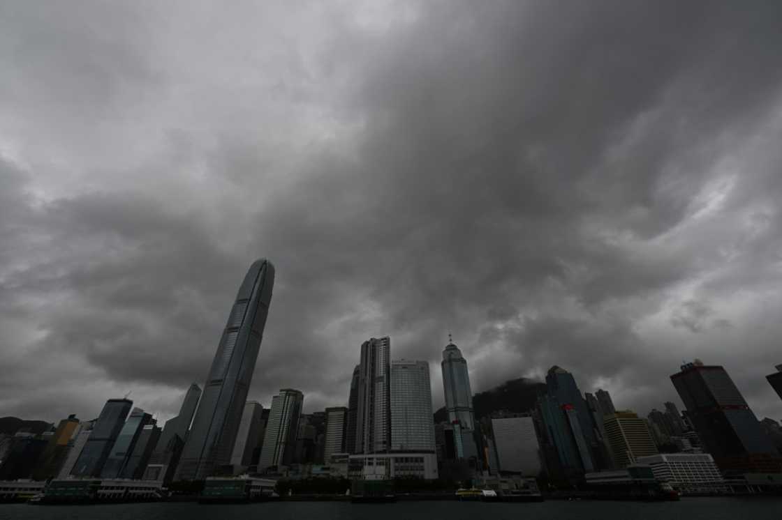 Hong Kong's stock exchange will implement new rules in September to continue trading through inclement weather Hong Kong's stock exchange will implement new rules in September to continue trading through inclement weather