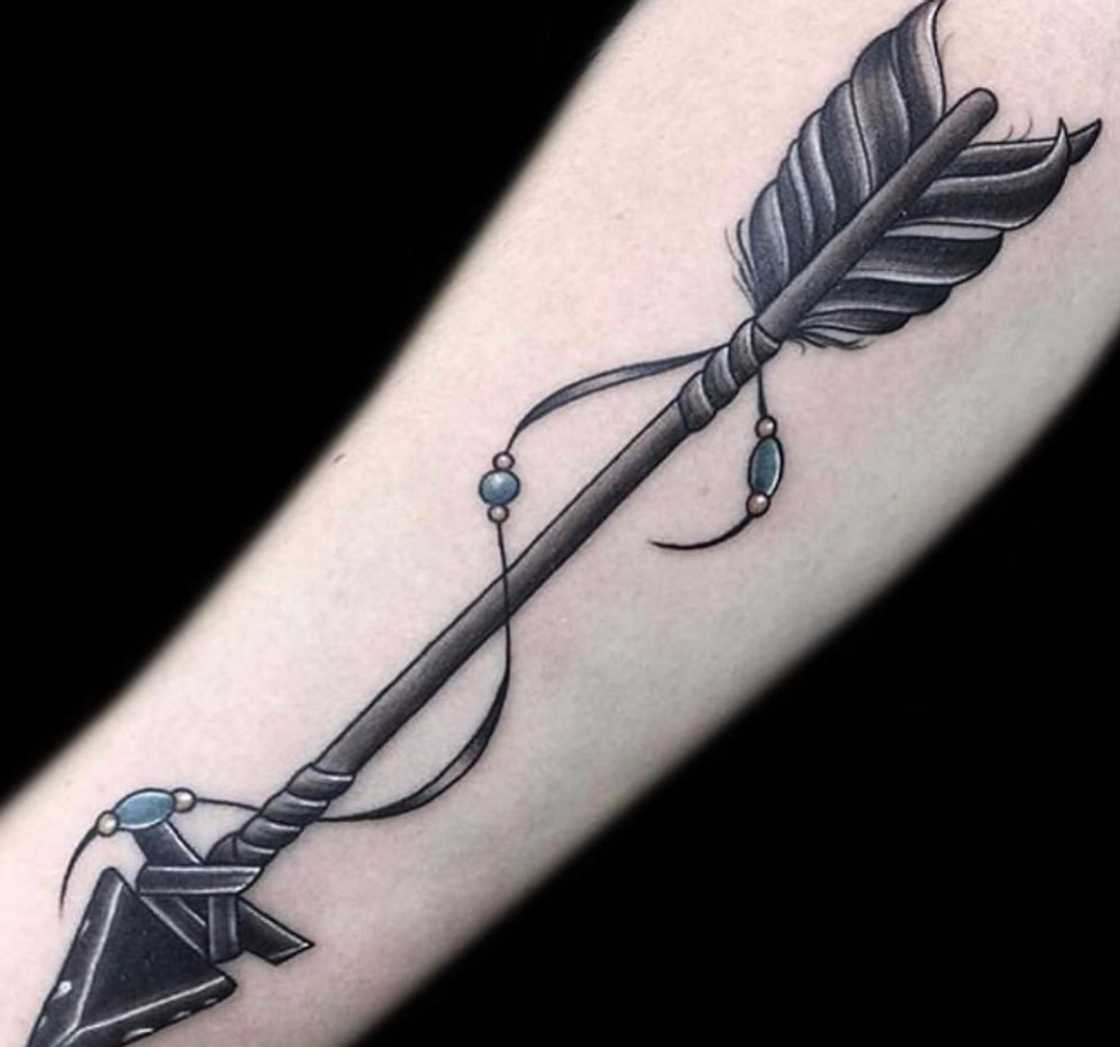 Follow your arrow tattoo