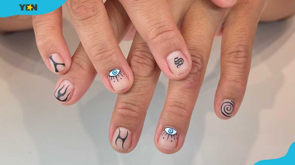 Mystic symbols nail tattoo Mystic symbols nail tattoo