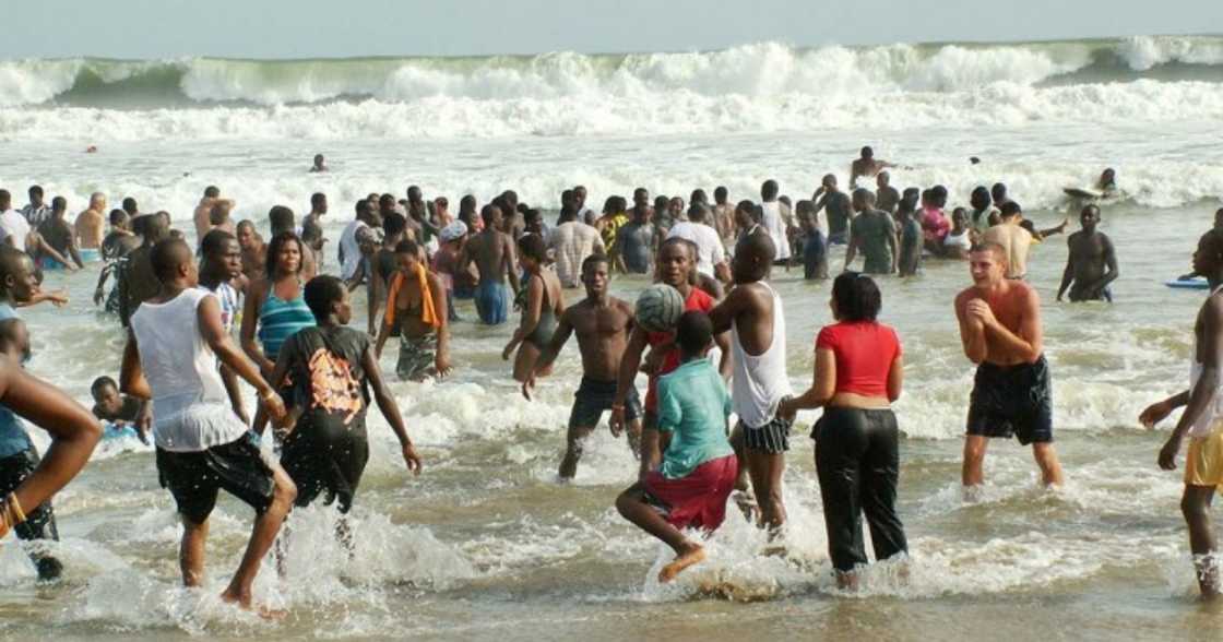 A photo of people at the beach