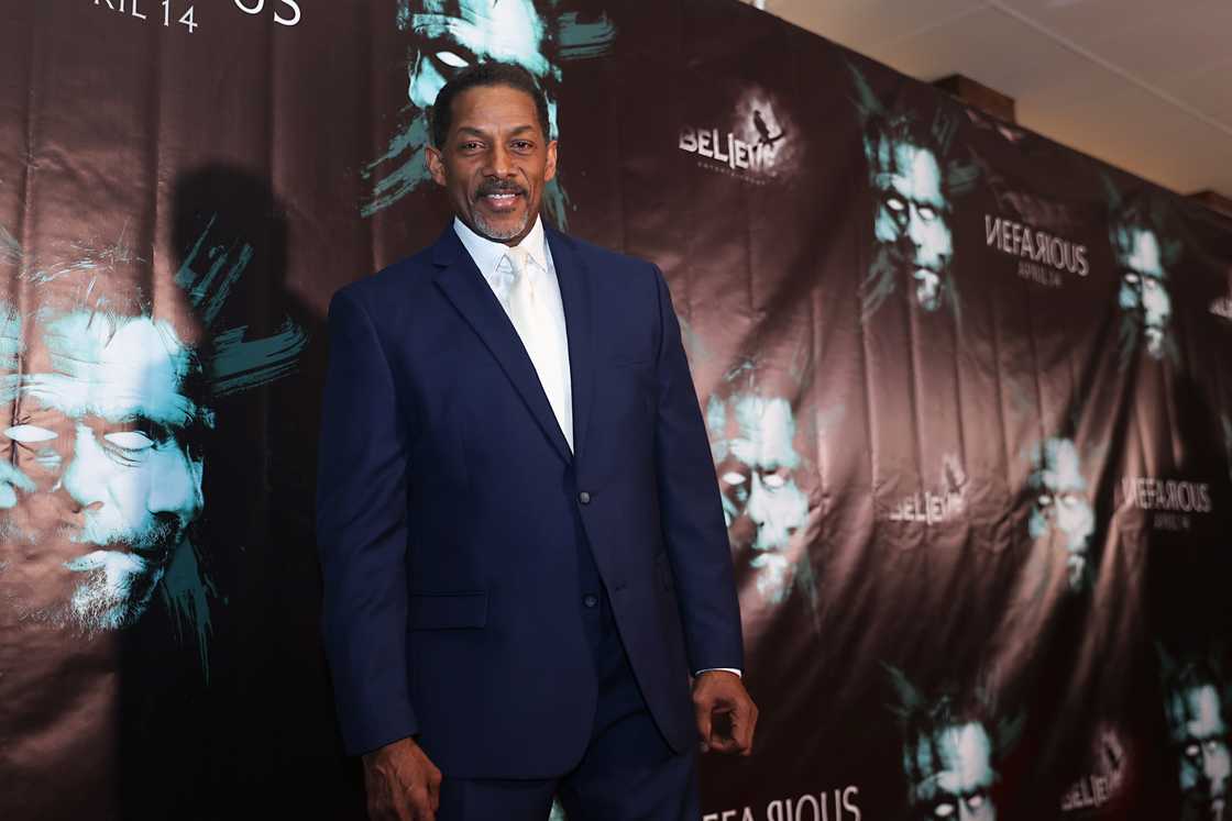 Actor Cameron Arnett poses on the red carpet upon arrival for "Nefarious" screening