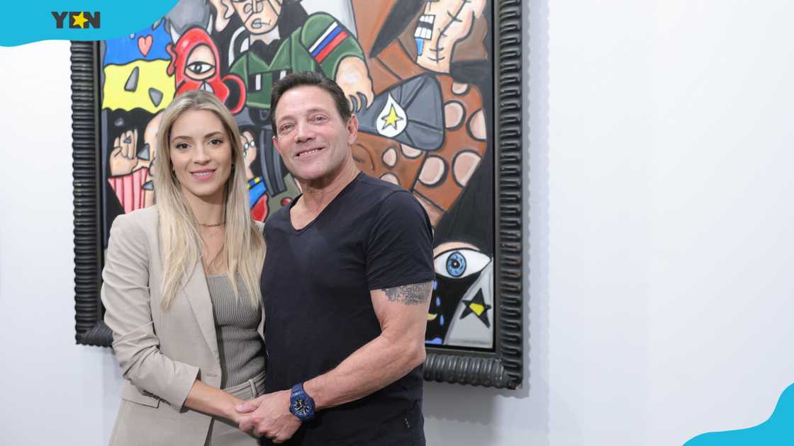 Cristina Invernizzi and Jordan Belfort attend Andres Valencia's "No Rules" exhibition opening reception.
