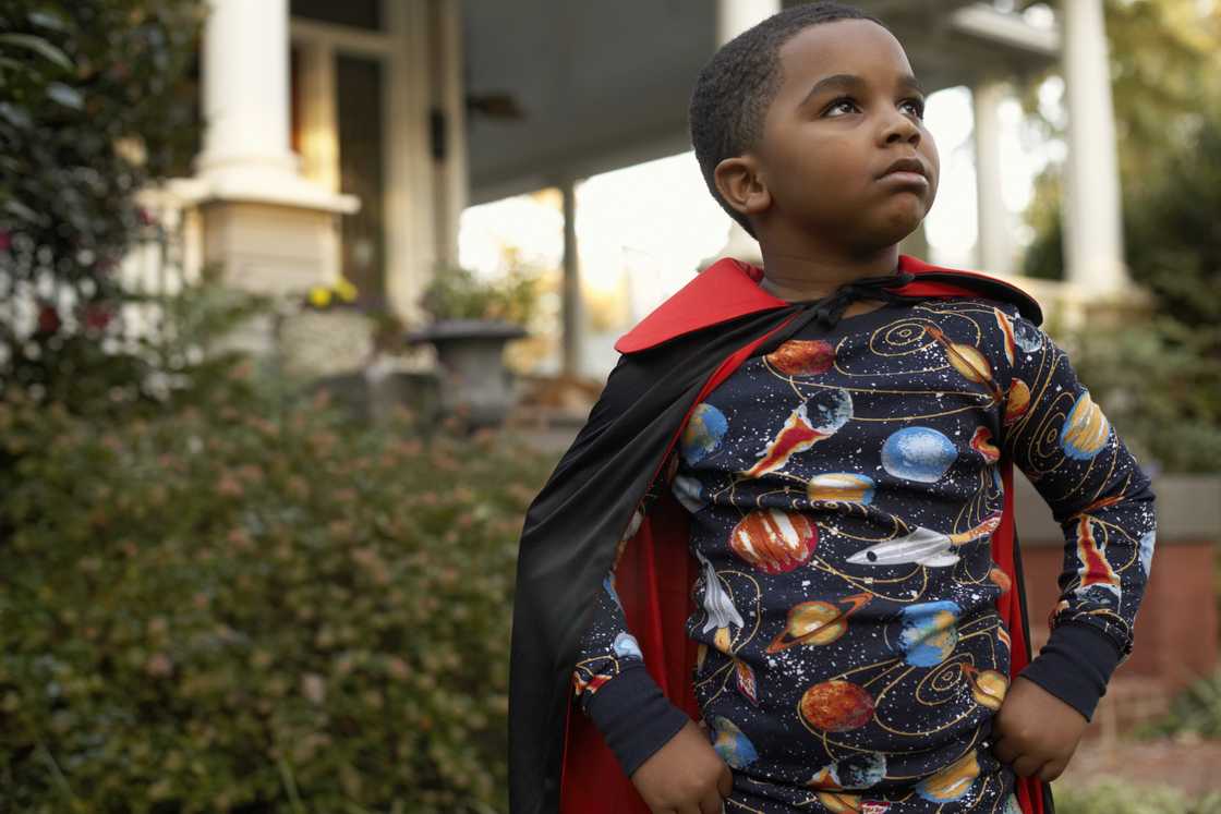 A small boy looking up