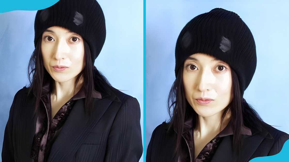 Reiko Kiuchi is posing for a photo Reiko Kiuchi is posing for a photo