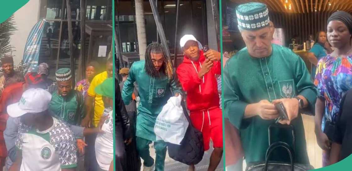 Super Eagles players wear green senators as they head for airport enroute to Abuja