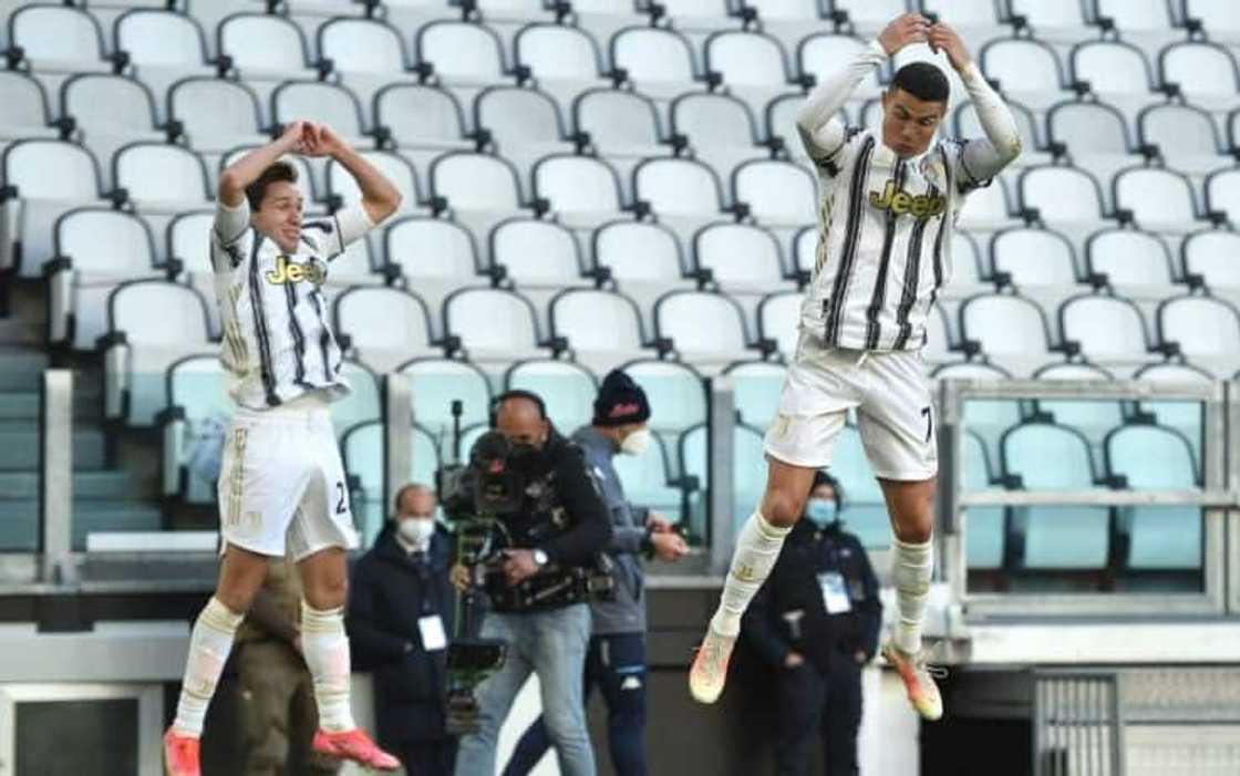 Cristiano Ronaldo celebrates a goal with Chiesa during his time at Juventus