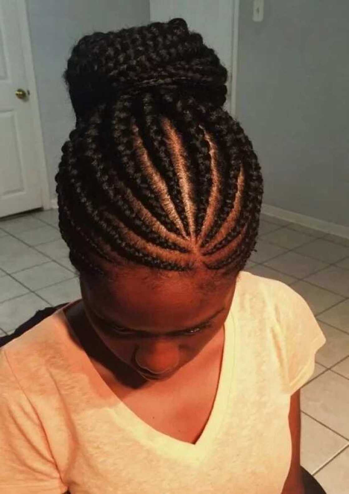 Cornrow braids in a high bun Cornrow braids in a high bun