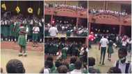 High school students show love; boy kneels for girl in viral video as they hug