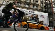 Coach owner to acquire Michael Kors, Versace parent in $8.5bn deal