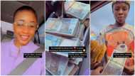 Kind lady keeps bundles of cash inside car, hands them to hawkers in viral video; many react