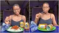 Lady causes stir as she finishes full plate of rice, gulps 2 canned drinks; photos pop up