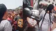 Angry Ghanaians grab lady who was giving strange meat from calabash to children in video