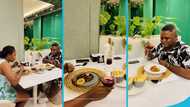 Enock Darko and his beautiful wife Deborah wine and dine on a private romantic date in a restaurant