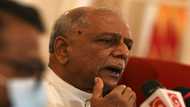 Sri Lanka cuts key interest rates, seeks China deal
