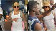 Ghanaian musician Kuami Eugene rocks a stylish sweater and jumpsuit to meet Rotimi for Cryptocurrency music shoot