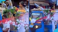 Ghanaian man cruises in town with his newly wedded wife inside a Pragya, netizens react