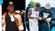 Shatta Wale gifts his diamond necklace and cash to Made In Ghana, video causes a stir: "You mum needs help"